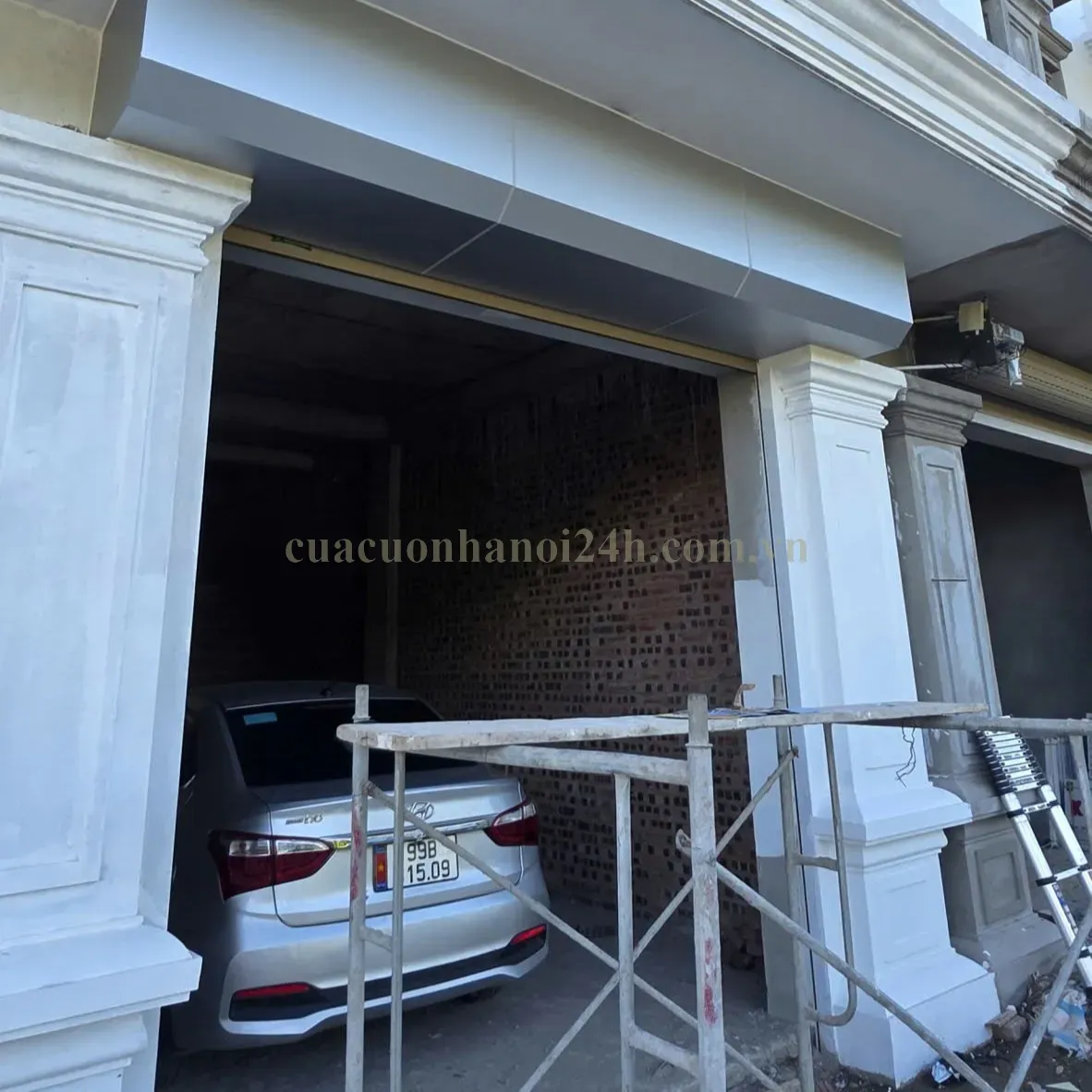Lắp đặt cửa cuốn tấm liền nhà dân